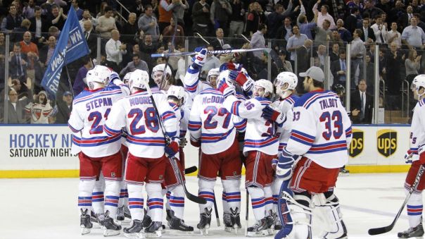 rangers celabrate a win 12-8