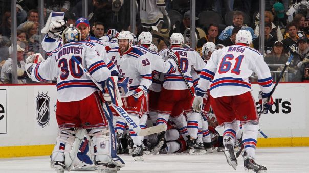 rangers celebrate an overtime win 4-22
