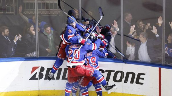 rangers celebrate an overtime goal 5-13