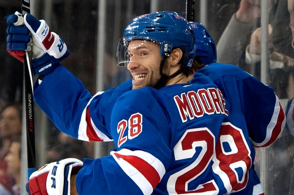 New YORK, USA - MARCH 26TH : Philadelphia Flyers VS New York Rangers at Madison Square Garden: New York New York Rangers center Dominic Moore #28 is all smiles after Rangers right wing Derek Dorsett #15 scores a goal during the first period. (Photo by Anthony J. Causi)