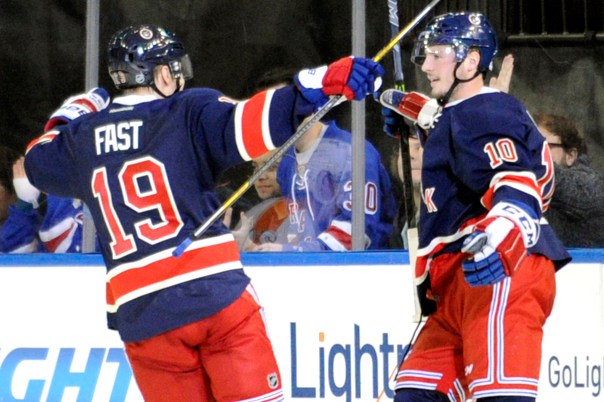 New York Rangers' J.T. Miller, right, celebrates his goal with Jesper Fast (19) during the third period of an NHL hockey game against the Philadelphia Flyers Saturday, Nov. 29, 2014, at Madison Square Garden in New York. The Rangers won 5-2. (AP Photo/Bill Kostroun)