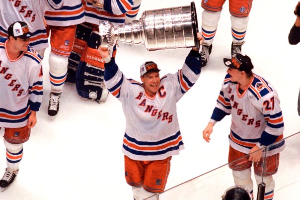 6/14/94 Rangers v. Canucks Mark Messier holds the Stanley Cup after the Rangers win the NHL Championship.