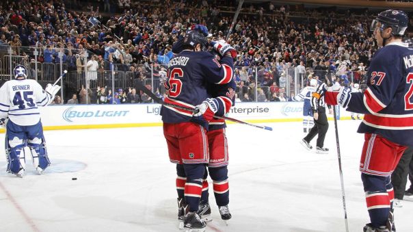 derick brassard and mats zuccarello hug 10-30