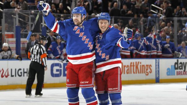 Dylan McIlrath and Jesper Fast celebrate 1-25