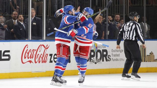 dylan mcilrath and keith yandle celebrate 12-15